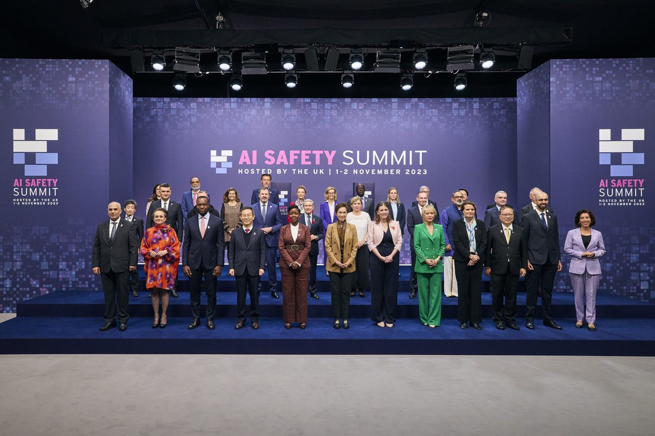 Government ministers and delegates posing for an official group photograph at the UK AI Safety Summit