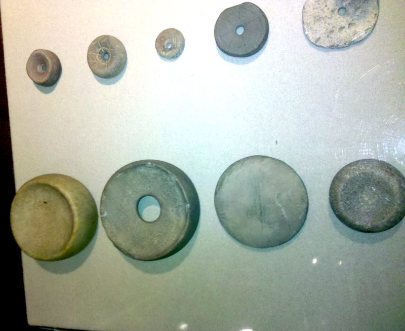 A group of ground stone discoidals, chunkey stones, used for the game of chunkey
