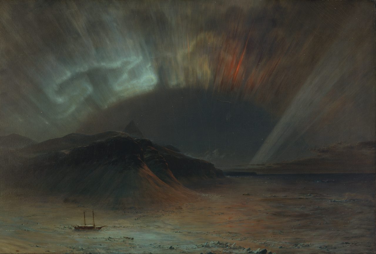 A dark oil painting of an Arctic night: a small two masted ship with a dark red hull locked in pale ice at the lower left, a large black headland rising behind it, and above them a pale ribboned curtain of light at the upper left, a red orange shaft right of centre and broad pale rays fanning down to the right over open water.