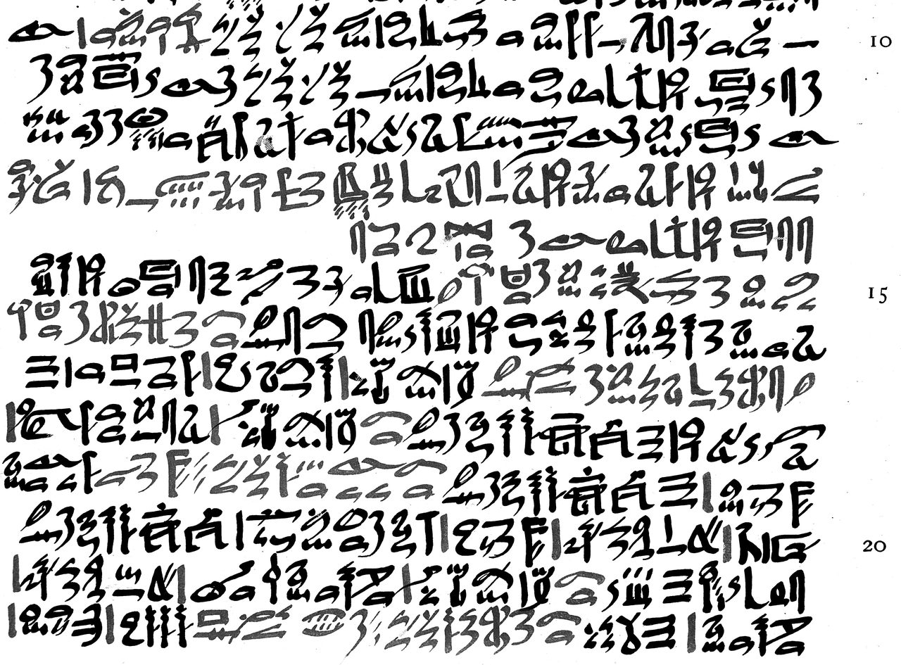 A facsimile reproduction of a page of Egyptian papyrus with dense hieratic script arranged in horizontal lines and printed marginal line numbers
