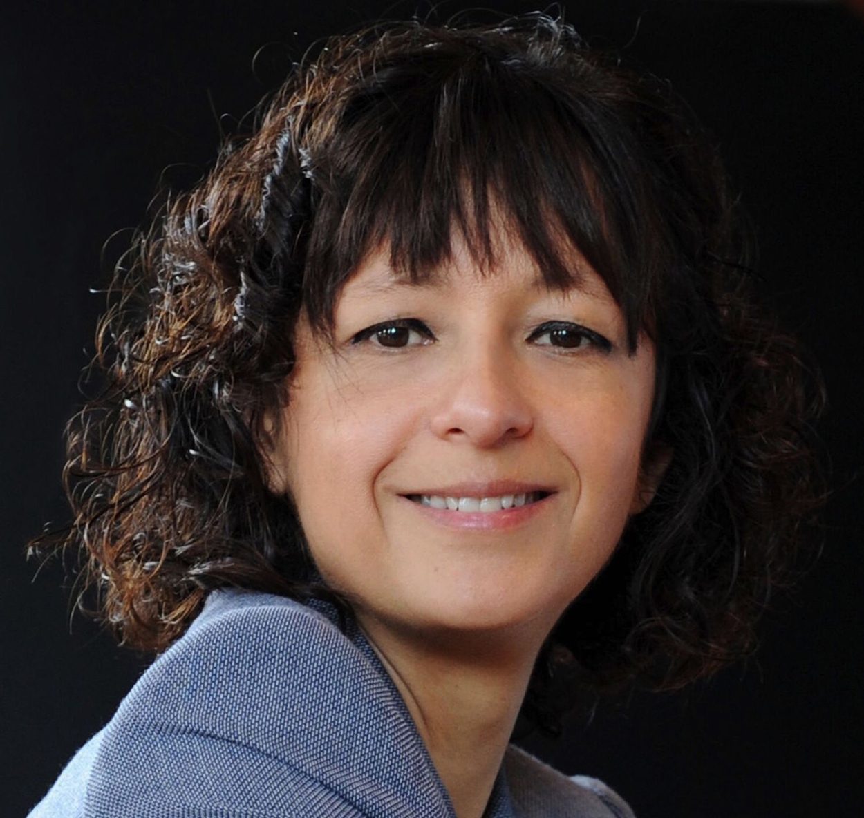 A portrait photograph of Emmanuelle Charpentier