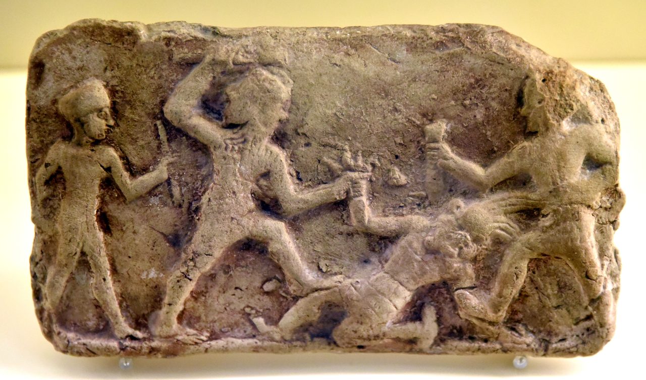 An Old Babylonian terracotta relief plaque depicting Gilgamesh and Enkidu slaying Humbaba at the Cedar Forest