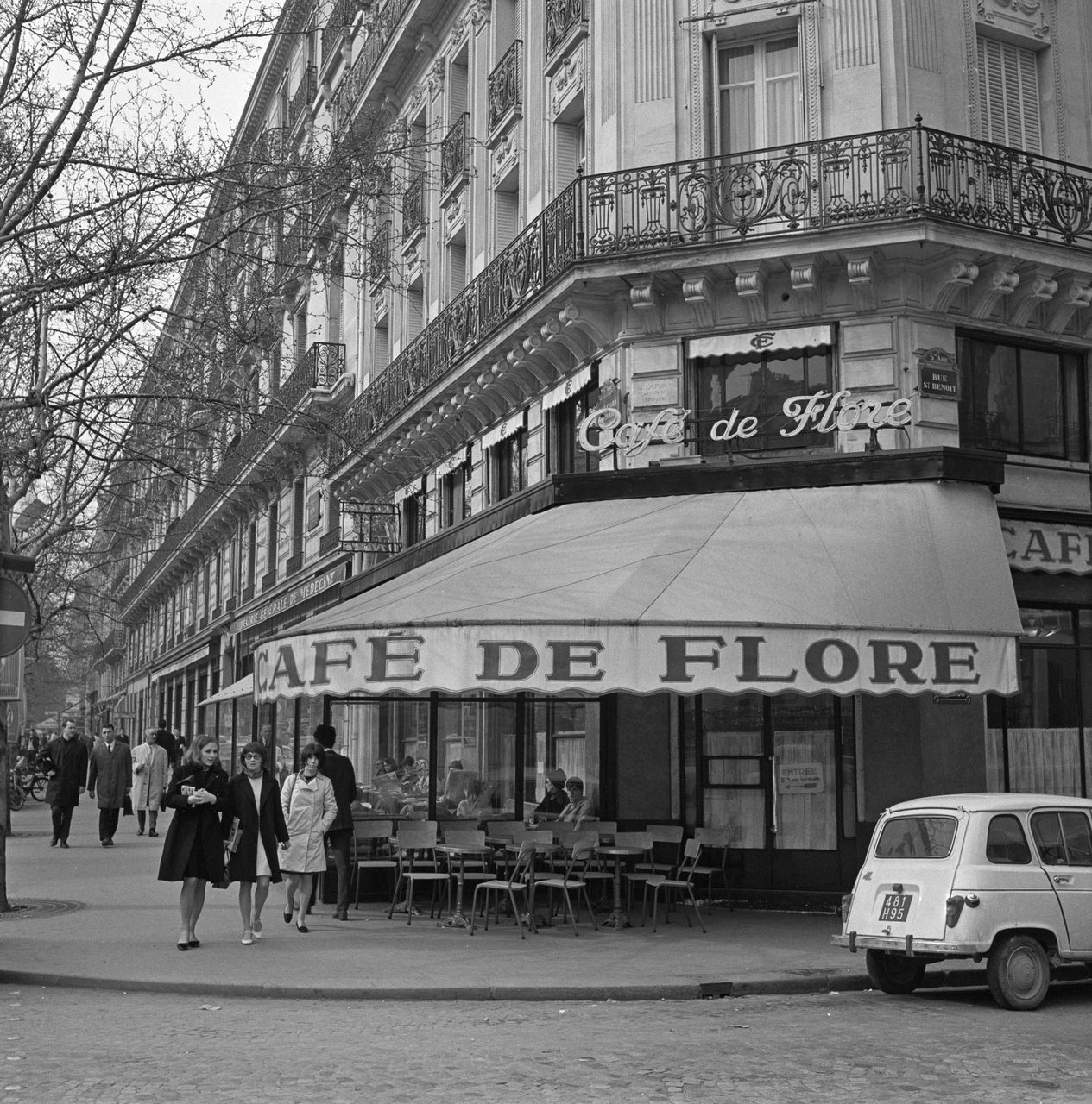 A 1965 street photograph of the Cafe de Flore in Saint-Germain-des-Pres, Paris