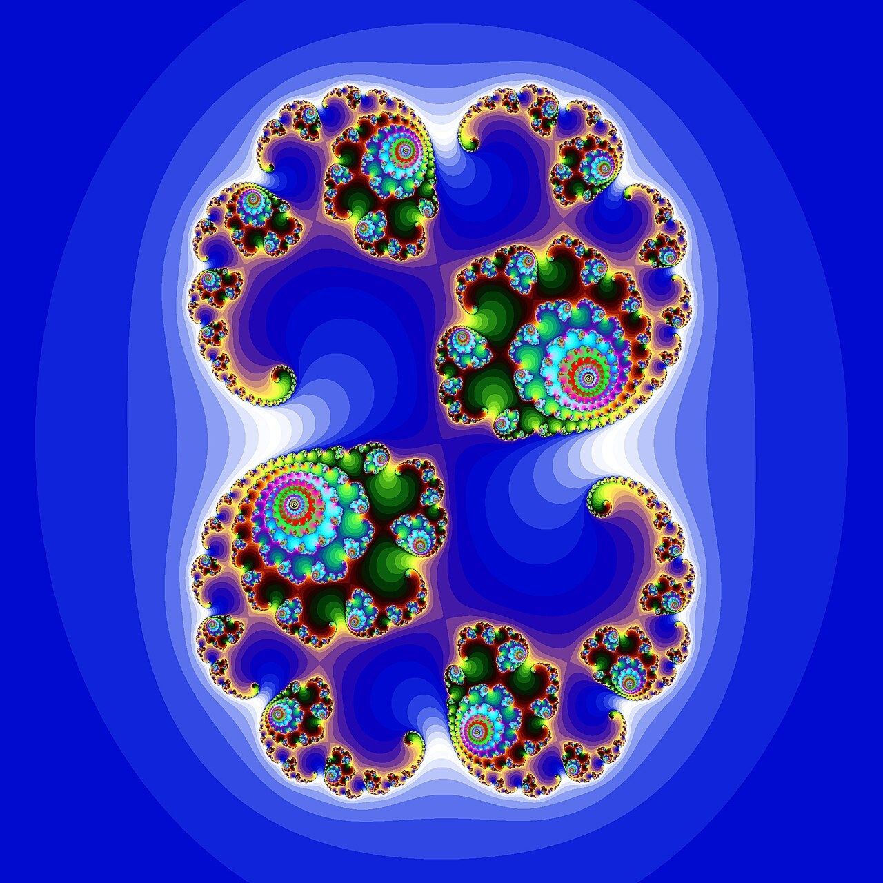 A vividly colored render of a Julia set: swirling paisley-like spiral arms in rainbow colors branching symmetrically against a blue background