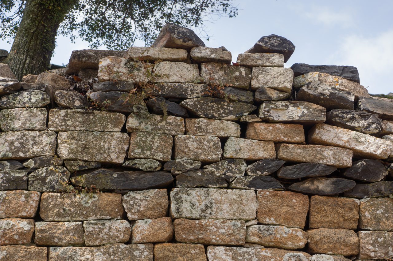 The exterior wall of the Great Enclosure at Great Zimbabwe, built of shaped granite laid without mortar