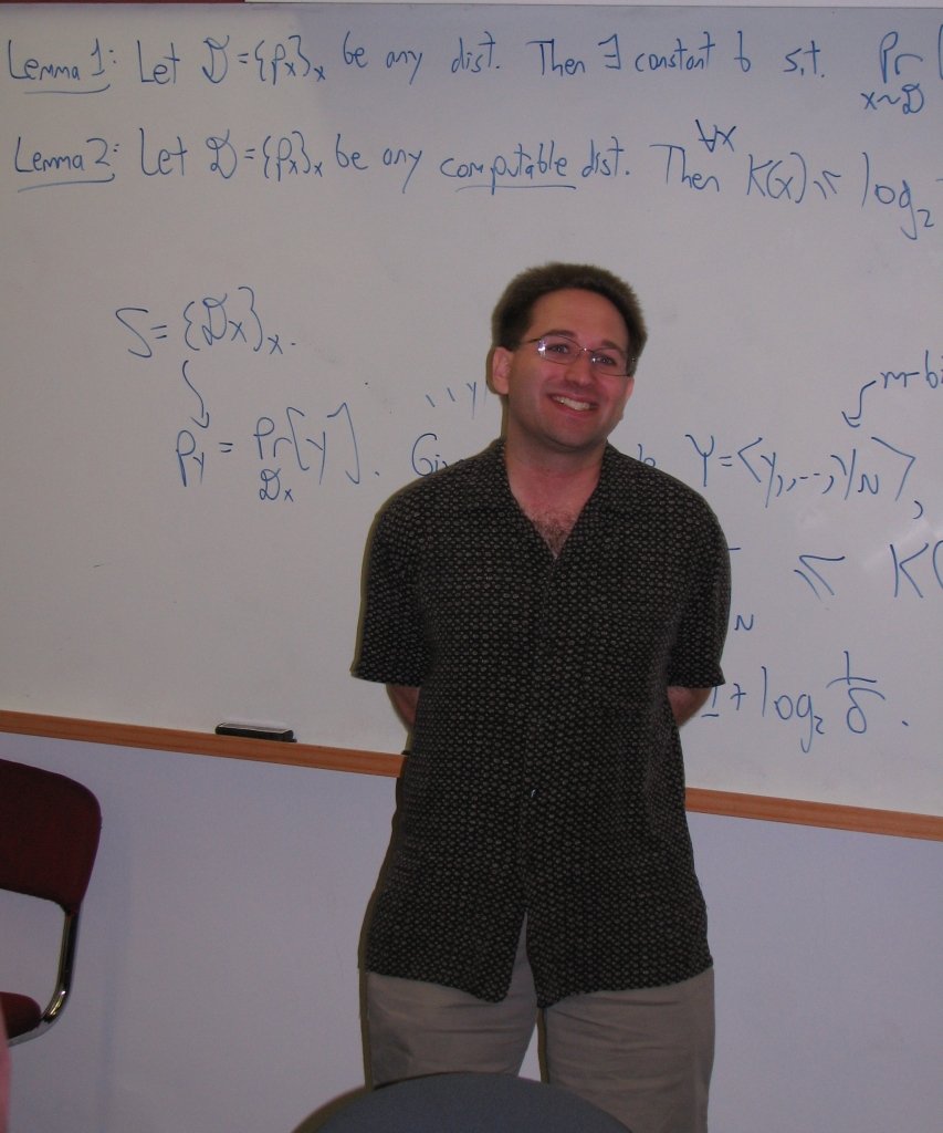 A photograph of the theoretical computer scientist Scott Aaronson lecturing