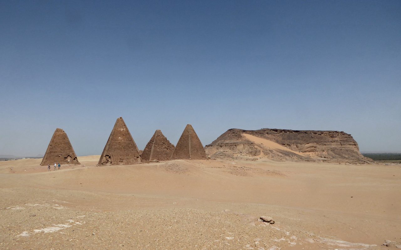 The flat-topped Jebel Barkal butte with pyramids clustered at its base