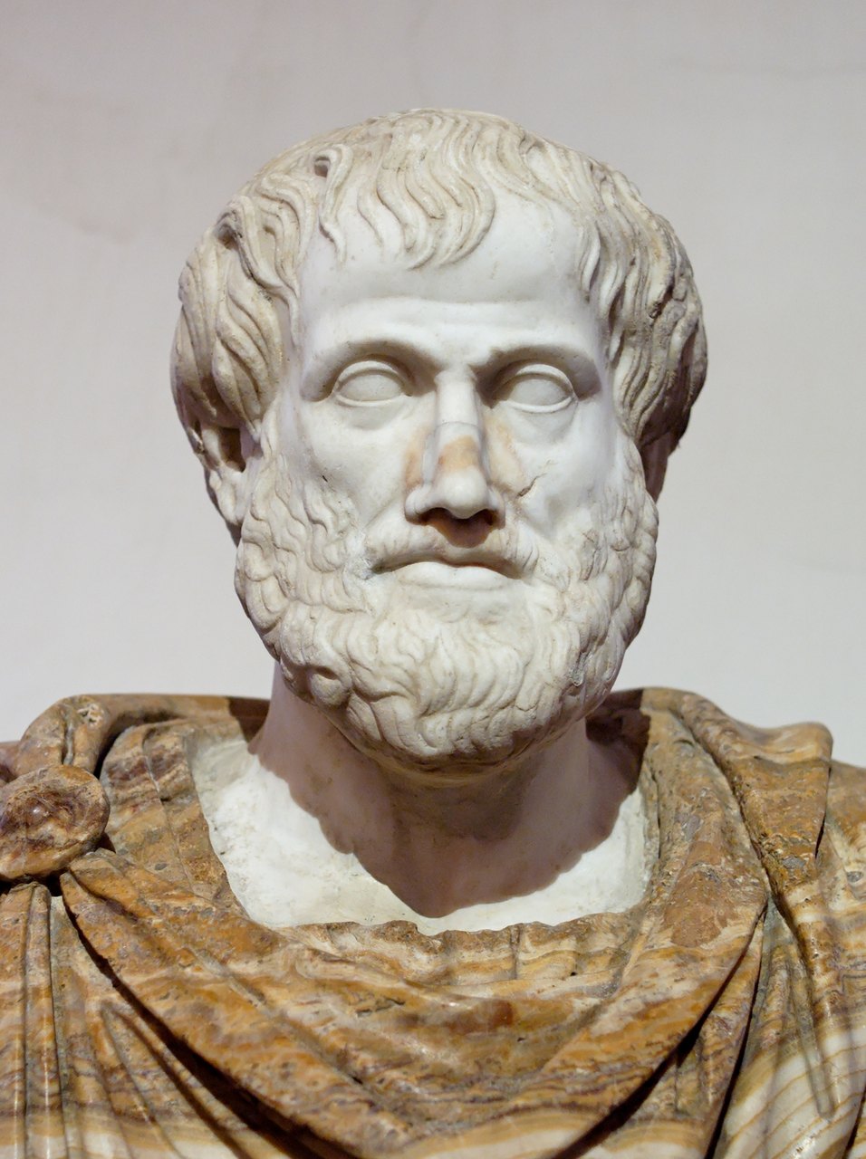 A marble portrait bust of the philosopher Aristotle, a Roman-era copy after a lost Greek bronze