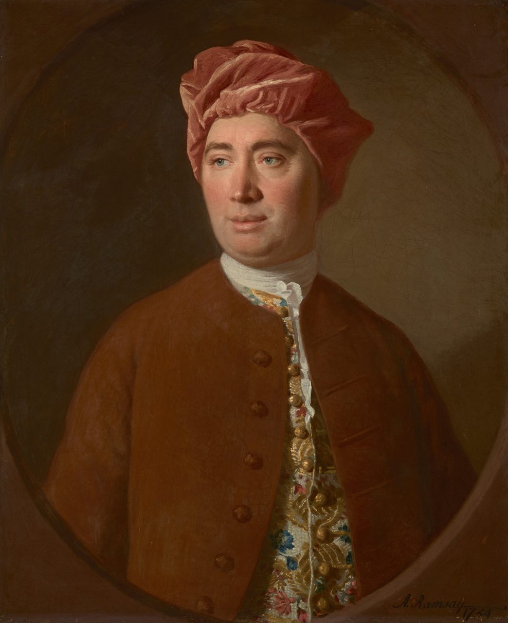 An oil portrait of David Hume painted by Allan Ramsay in 1754, the sitter in a soft pink cap and a plain brown coat over an embroidered waistcoat, set inside a painted oval