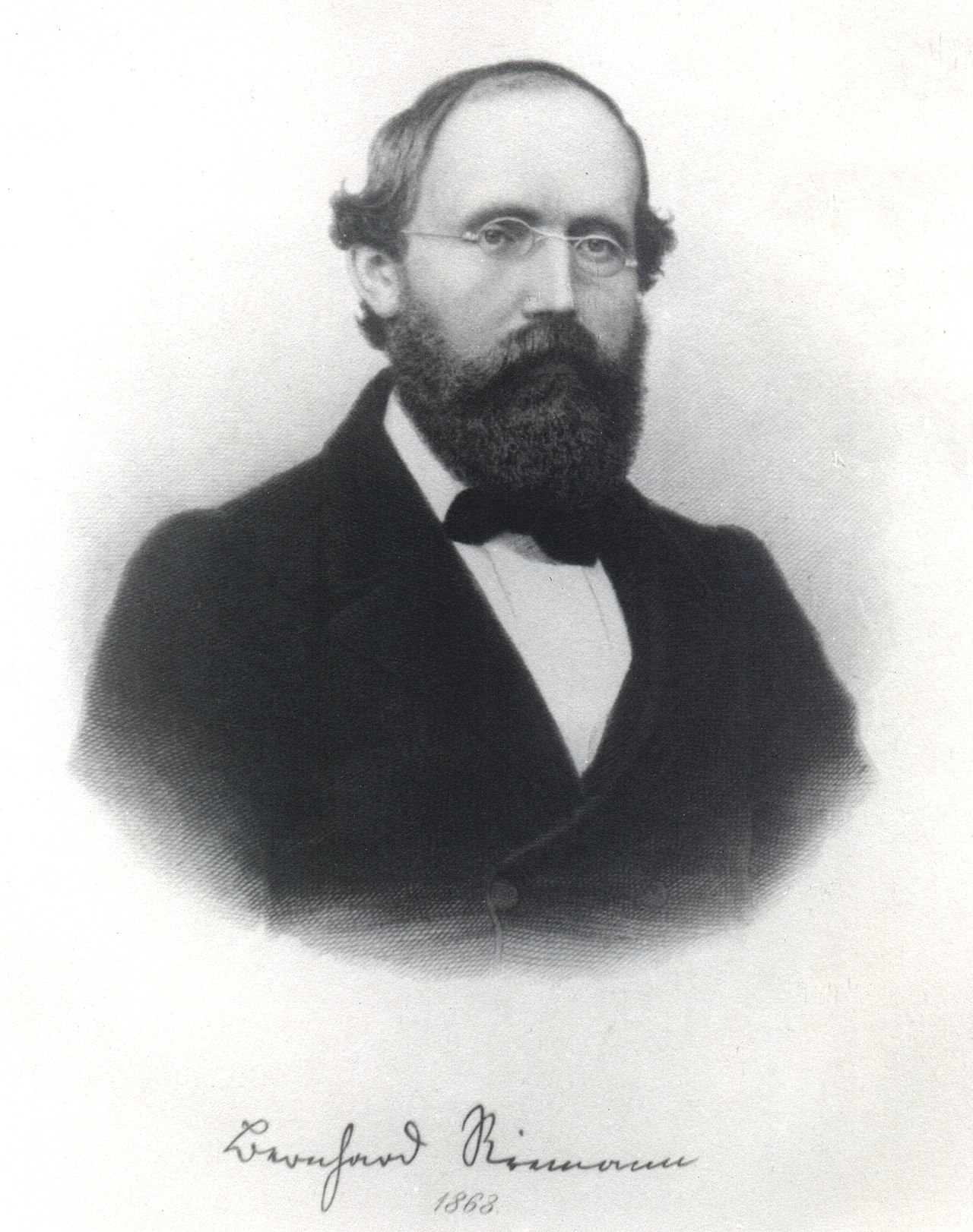 A nineteenth-century black-and-white portrait of the bearded, bespectacled mathematician Bernhard Riemann in a dark coat and bow tie, with his signature and the date 1863 beneath