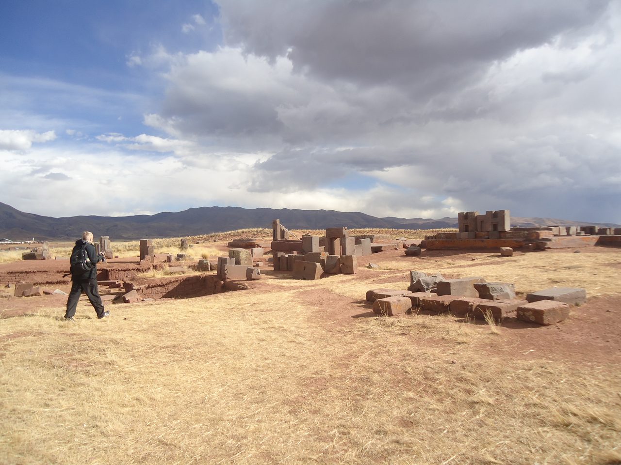 Scattered precisely cut andesite and sandstone megaliths at the Puma Punku platform mound, Tiwanaku, Bolivia