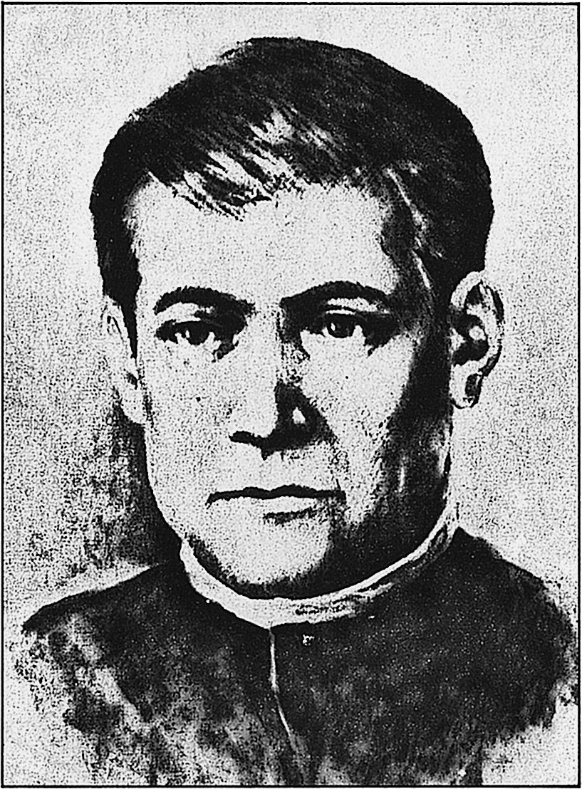 A head and shoulders portrait of a young man against a plain pale ground, facing slightly to his left, in a dark high-collared clerical habit with a narrow white collar showing at the throat. He has dark hair combed back from a high forehead and a level, unsmiling expression. The image is a coarse halftone with heavy printing grain.