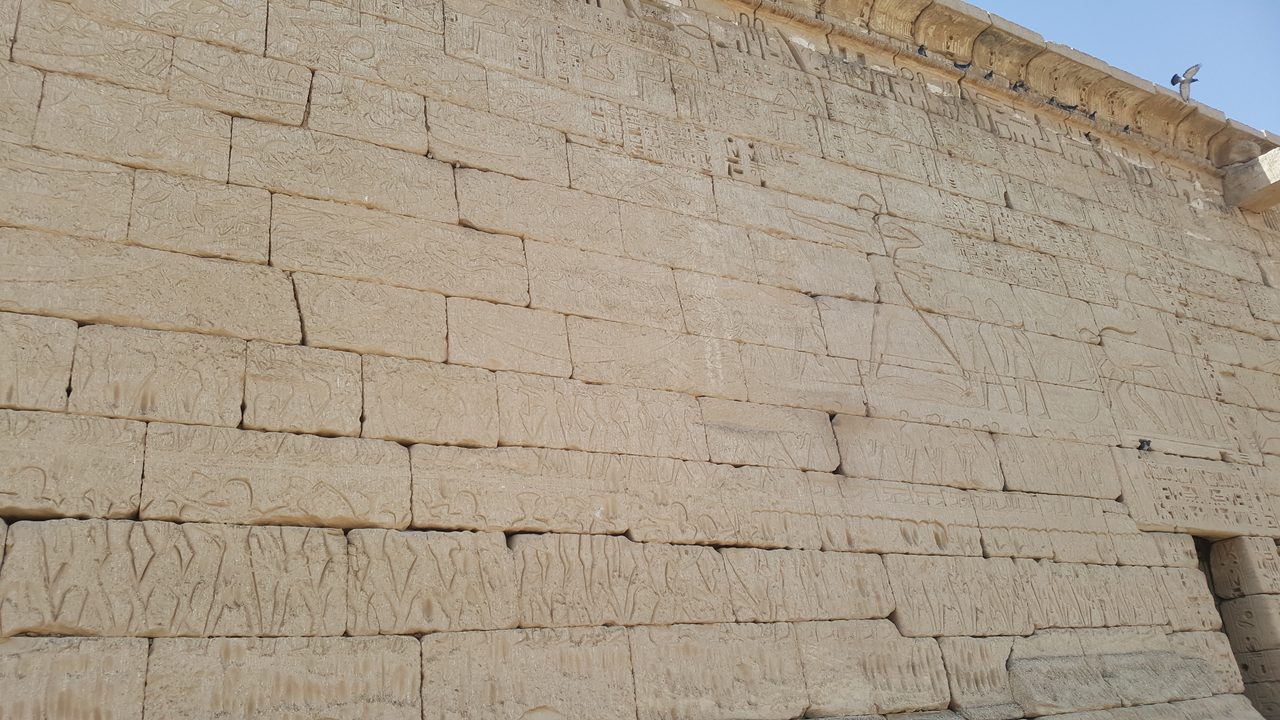 A wide view of the Battle of the Delta relief on the northeast wall of Medinet Habu Temple