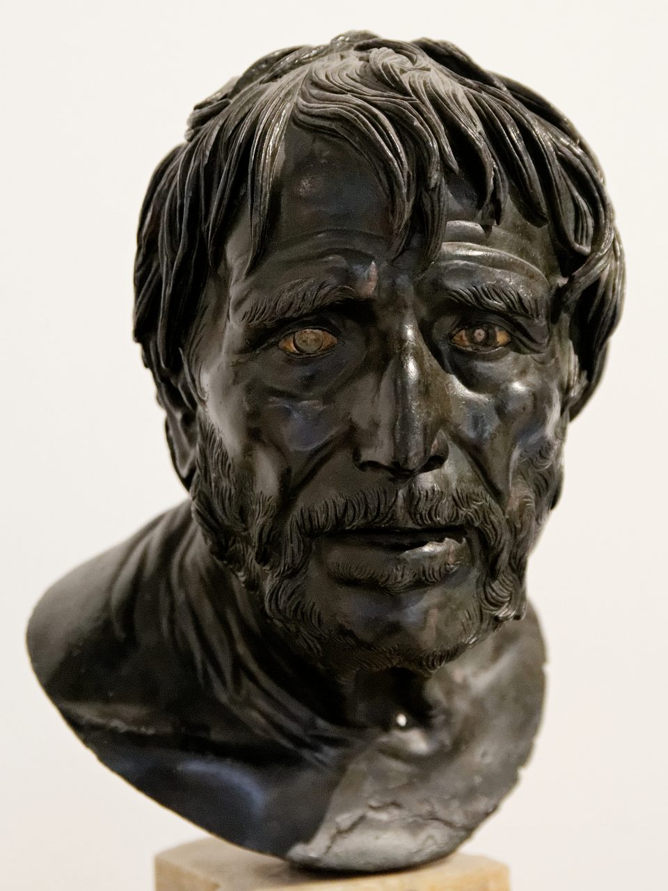 A bronze portrait head of a bearded man from the Villa of the Papyri at Herculaneum, traditionally called the pseudo-Seneca