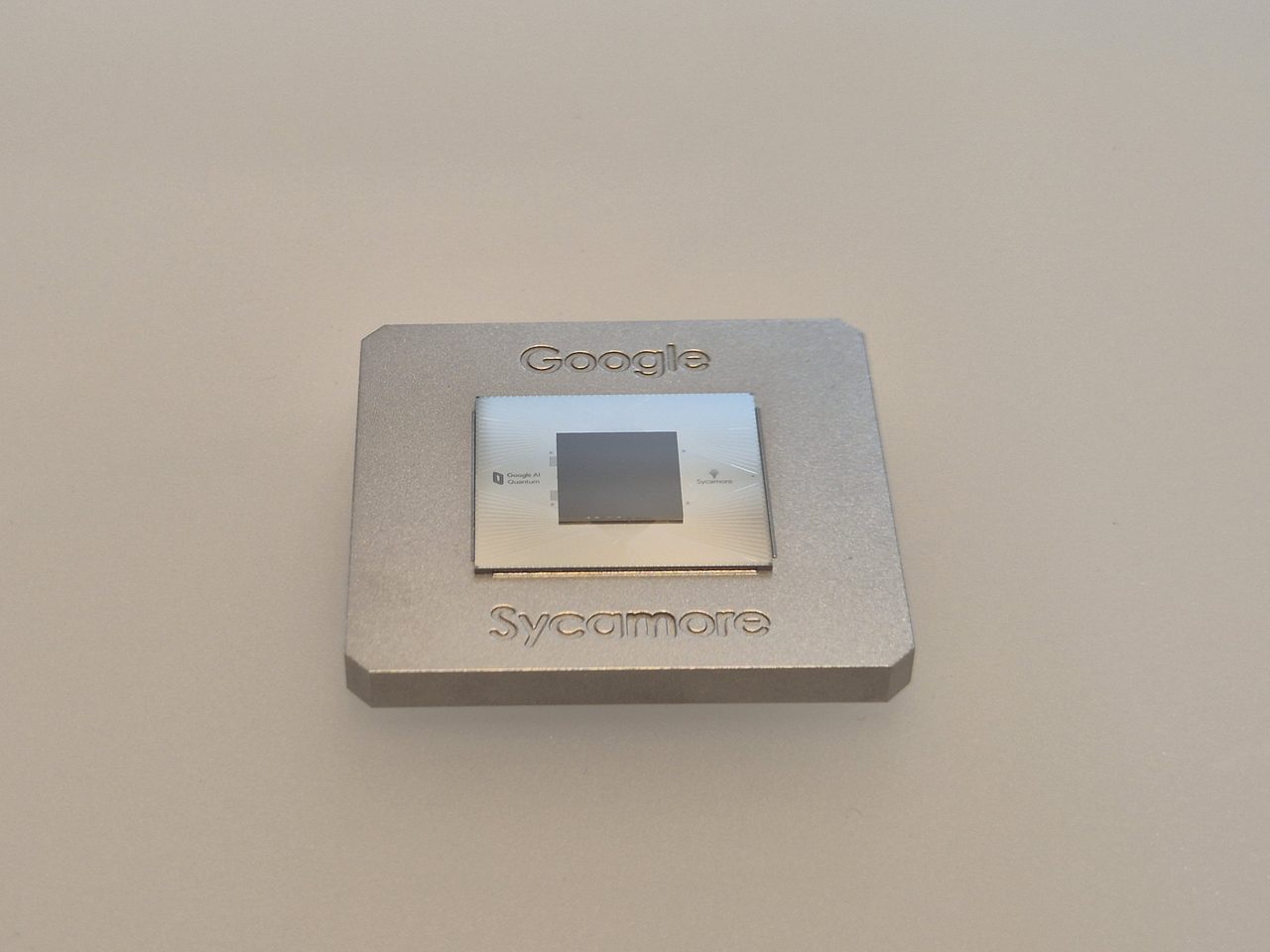 Google's Sycamore quantum processor chip, displayed on exhibit