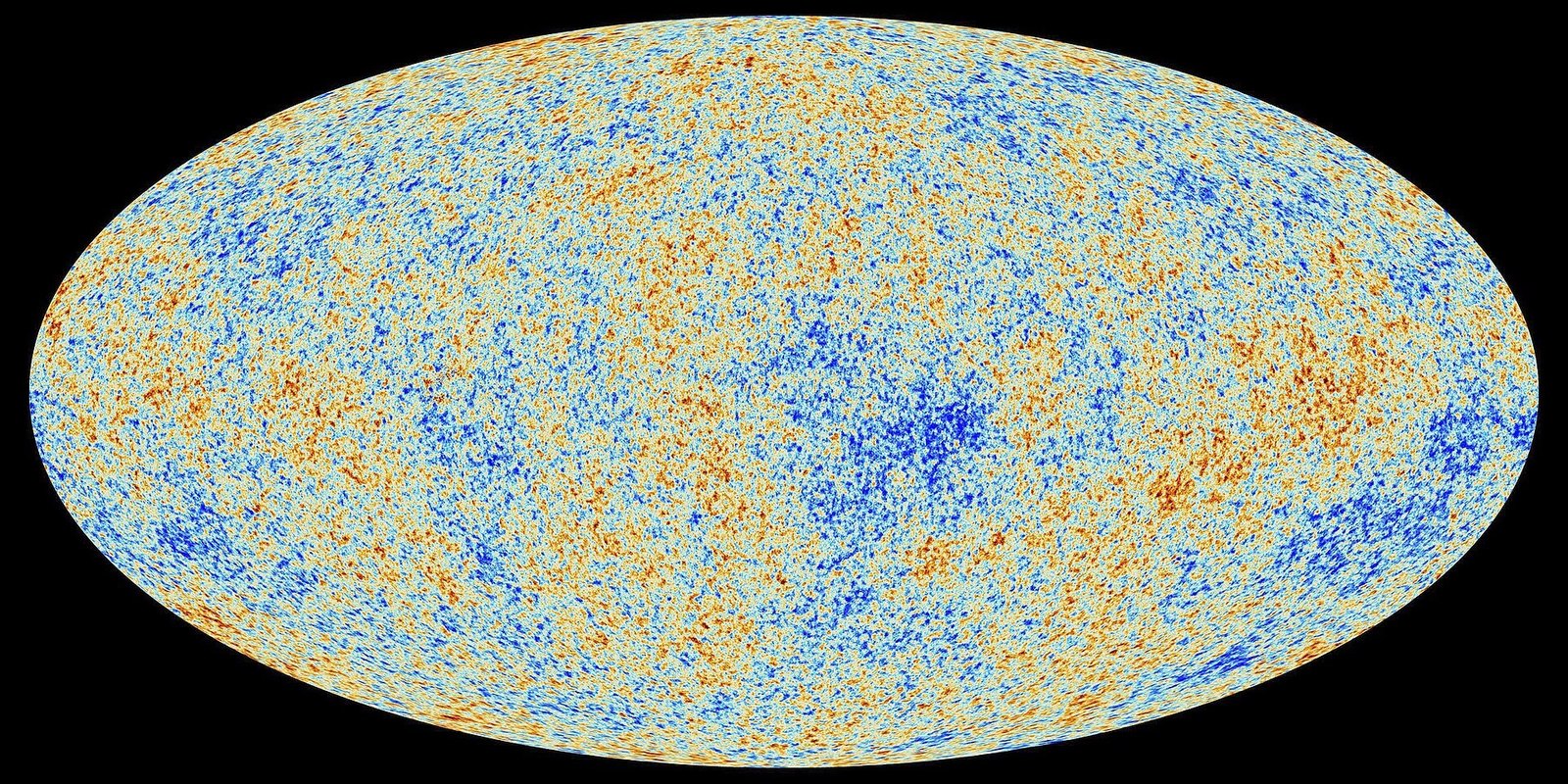 An oval all-sky map on a black background, filled with fine mottled speckles of orange and blue, the tiny temperature variations of the cosmic microwave background as measured by the Planck satellite